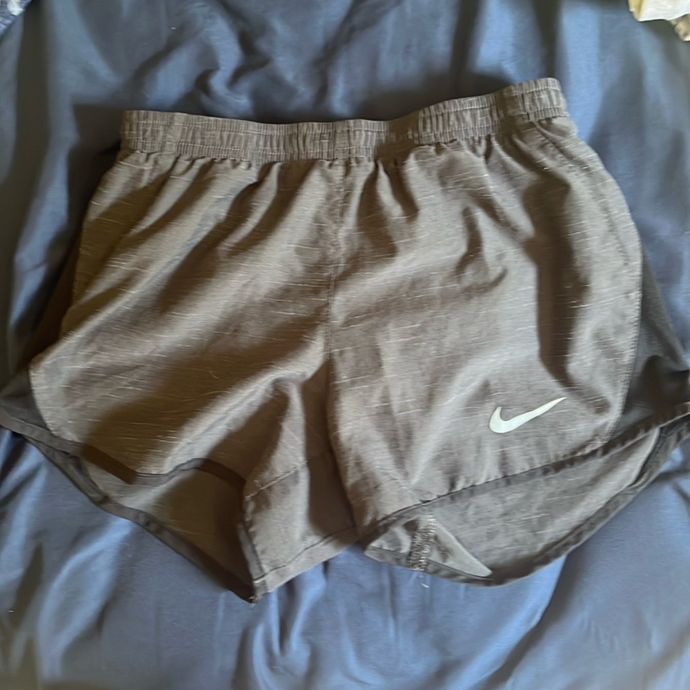 Nike brand grey and black athletic shorts
